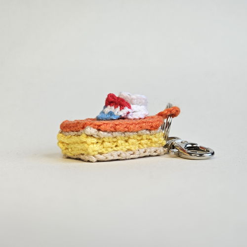 Mini oranje tompouce sleutelhanger