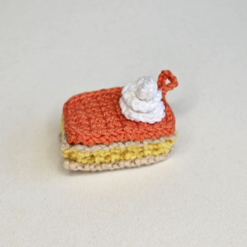 Mini oranje tompouce sleutelhanger